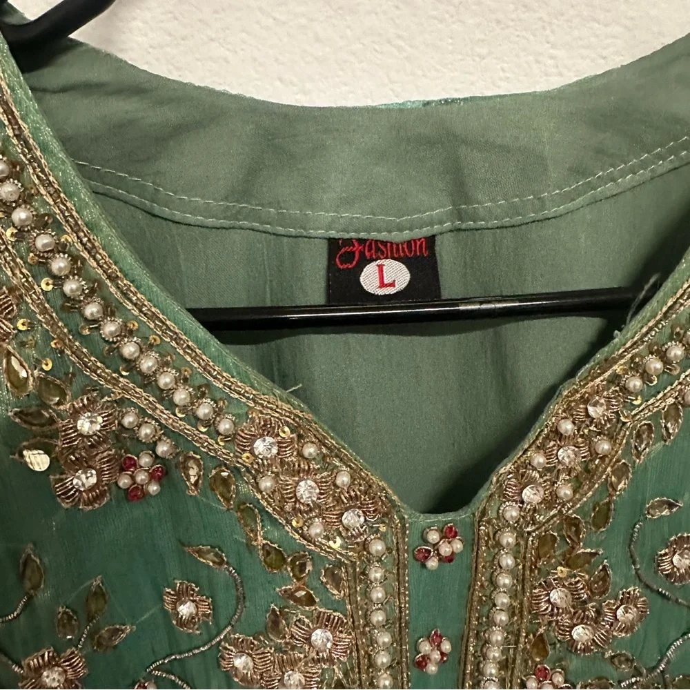 Two piece formal salwar kameez in a soft sea-green shade with intricate gold - Picture 5 of 9